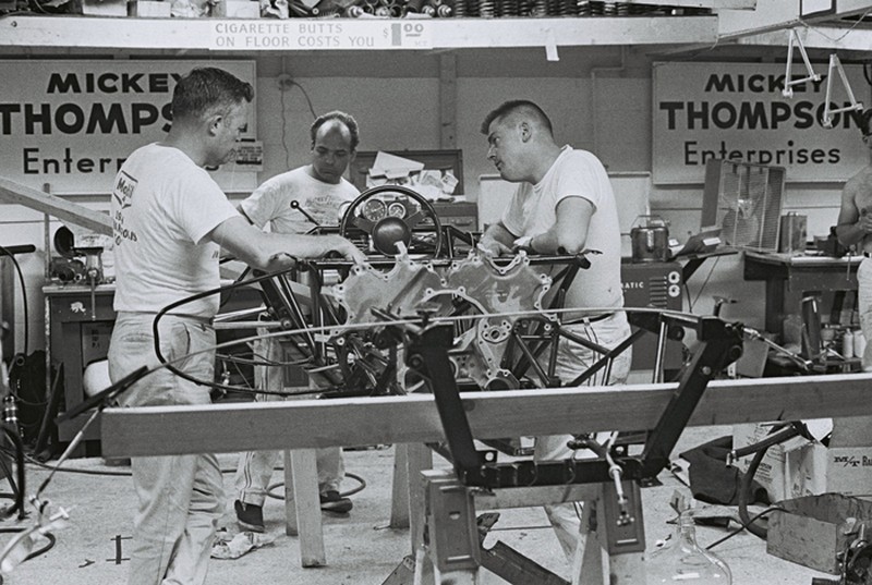 Mickey Thompson�s crew spent long hours in the Indy garage in May trying to get his racer to handle properly